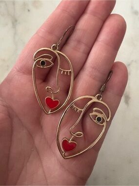 Gold Abstract Face Drop Earrings with Red Heart Accent